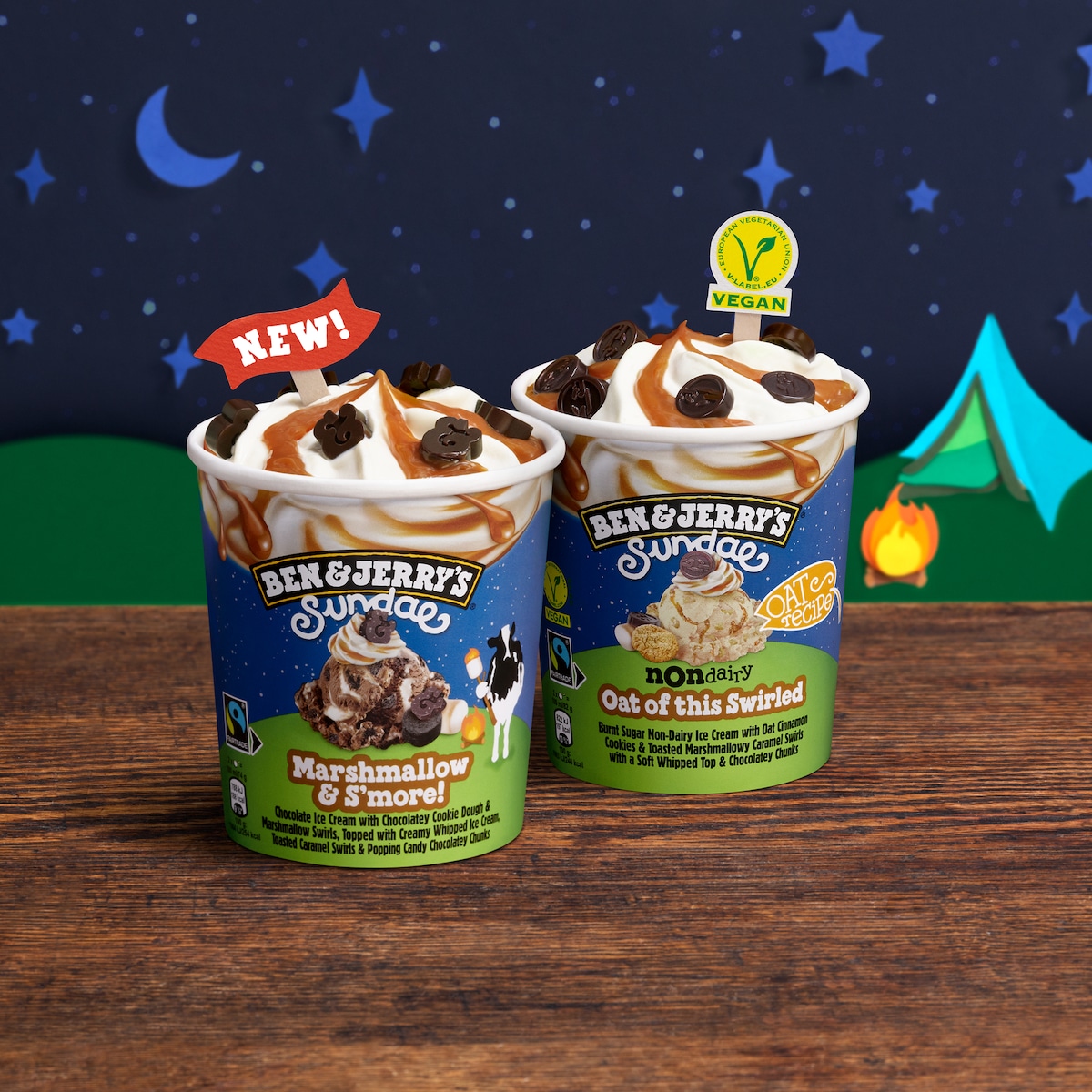 Pints of ice cream in front of an illustrated camping background